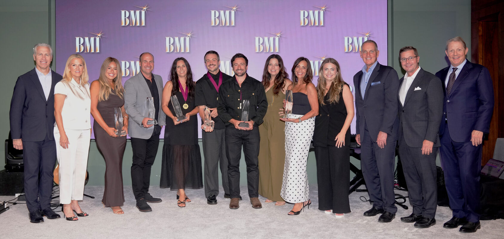 Photo L-R: BMI's Mike Steinberg, BMI's Leslie Roberts, Capitol CMG Publishing's Ellie McKay, Capitol CMG Publishing's David Gutekunst, First-time BMI award winning songwriter Jessie Early, First-time BMI award winning songwriter Blake Wiggins, BMI songwriter Jonathan Smith, Be Essential Songs' Jamie Rodgers, Be Essential Songs' Holly Zabka, Be Essential Songs' Jannah Smitherman, BMI's Mike O'Neill, BMI's Todd Horvath and BMI's Clay Bradley pose after winning BMI's Song of the Year for 