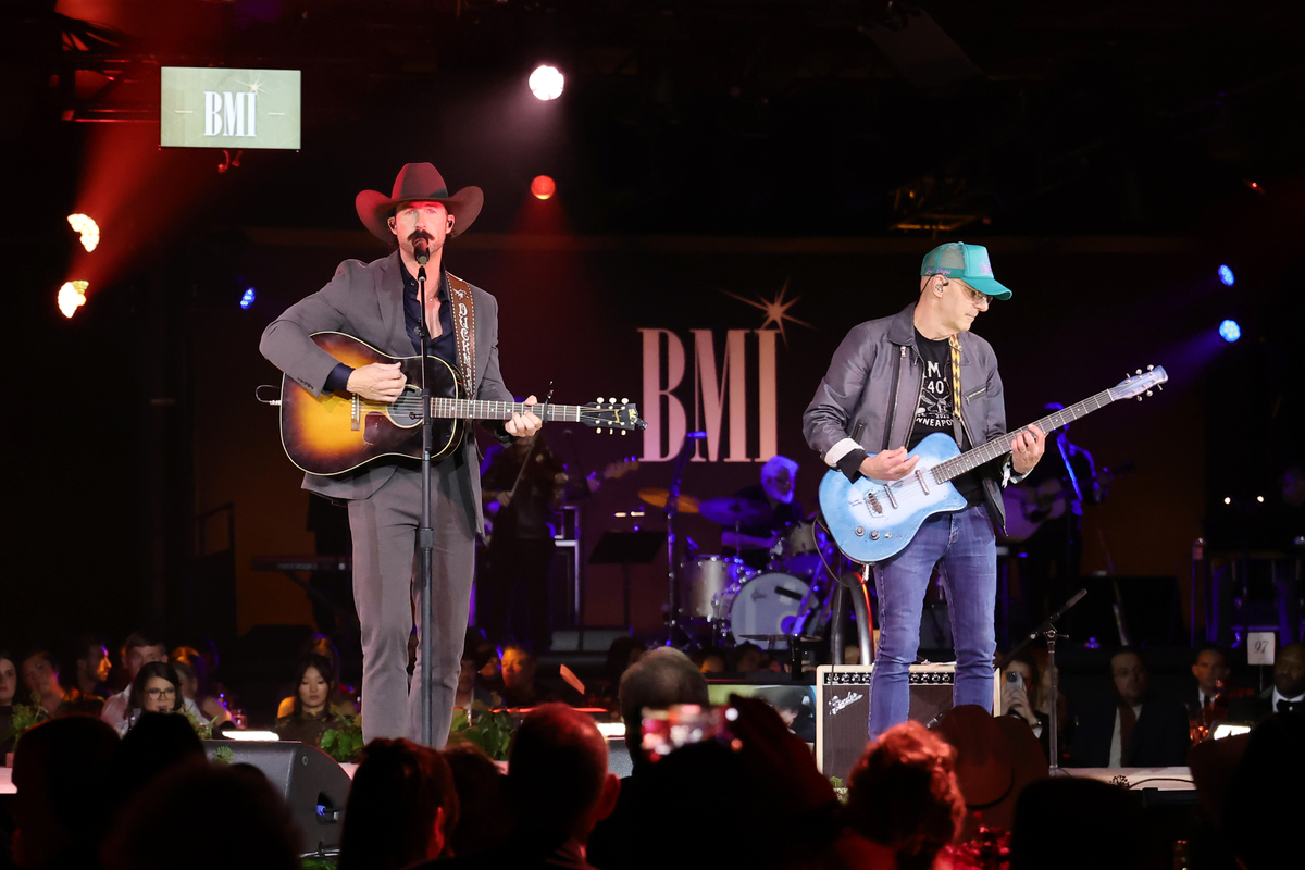 Riley Green (L) performs onstage during the 2025 BMI Country Awards at BMI on November 18, 2025 in Nashville, Tennessee. (Photo by Emma McIntyre/Getty Images for BMI)
