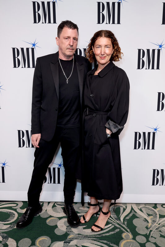 (L-R) Atticus Ross and Claudia Sarne attend the 2026 BMI Film, TV & Visual Media Awards at Beverly Wilshire, A Four Seasons Hotel on May 13, 2026 in Beverly Hills, California. (Photo by JC Olivera/Getty Images for BMI)