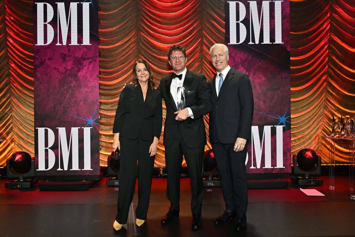 (L-R) Tracy McKnight, VP, Creative, Film, TV & Visual Media, BMI, Thomas Schraeder, winner of the BMI Award for 