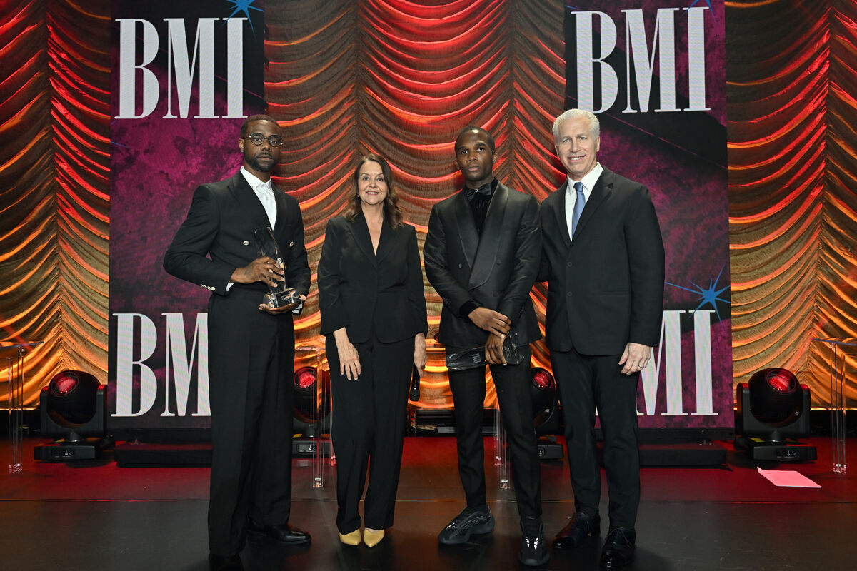 BARii (L) and Nkenge Kamau (2nd from R), winners of the BMI Award for 