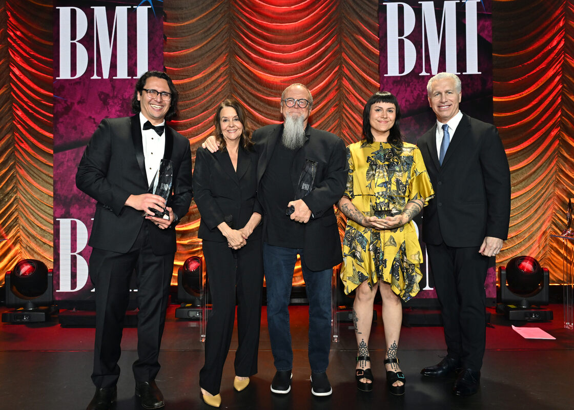 Sean Kiner (L), Kevin Kiner (C), and Deana Kiner (2nd from R), winners of the BMI Award for 