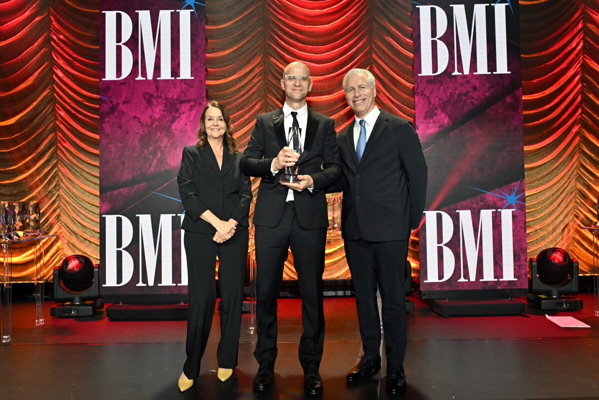 (L-R) Tracy McKnight, VP, Creative, Film, TV & Visual Media, BMI, Theodore Shapiro, winner of the BMI Award for 