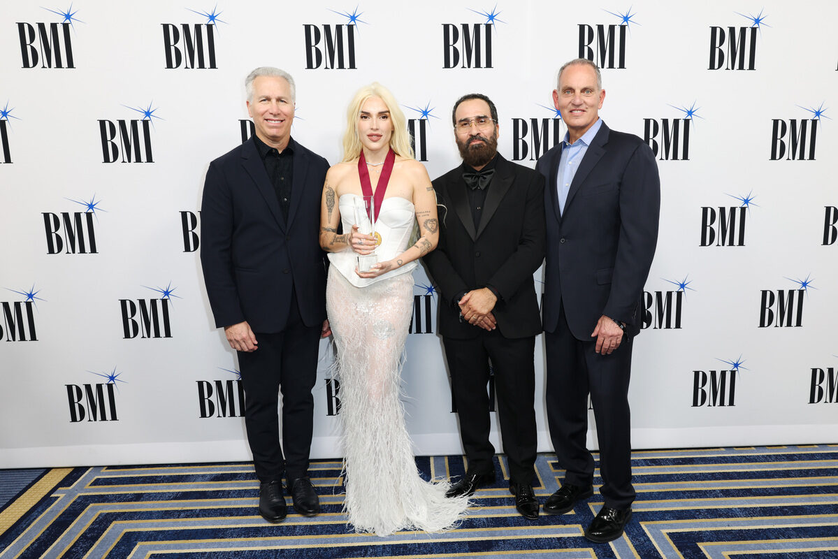 (L-R) Mike Steinberg, BMI Executive Vice President, Chief Revenue & Creative Officer, Elena Rose, Jesus Gonzalez, BMI Vice President, Creative, Latin and Mike O'Neill, BMI CEO attend the 2026 BMI Latin Awards on March 19, 2026 in Miami, Florida. (Photo by Alexander Tamargo/Getty Images)
