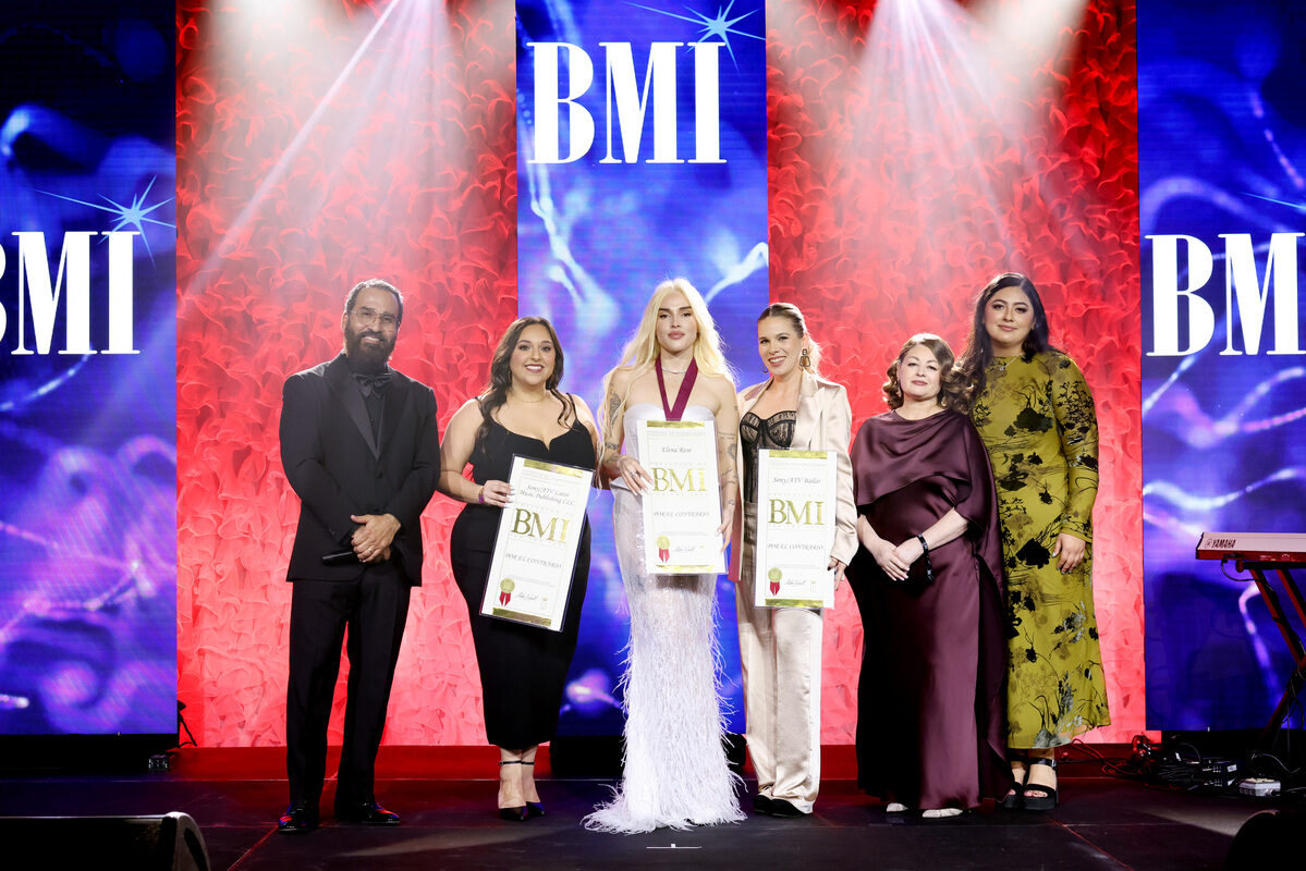 Jesus Gonzalez, BMI Vice President, Creative, Latin, Elena Rose, BMI's Maggie Ortiz and BMI's Alondra Lopez accept the BMI Top Latin Song Award for 