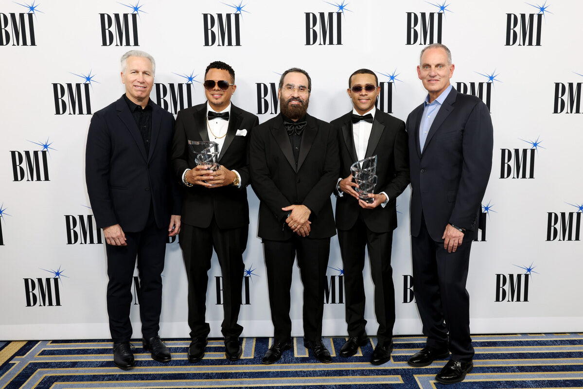 Mike Steinberg, BMI Executive Vice President, Chief Revenue & Creative Officer, Luny Tunes, Jesus Gonzalez, BMI Vice President, Creative, Latin and Mike O'Neill, BMI CEO attend the 2026 BMI Latin Awards on March 19, 2026 in Miami, Florida. (Photo by Alexander Tamargo/Getty Images)