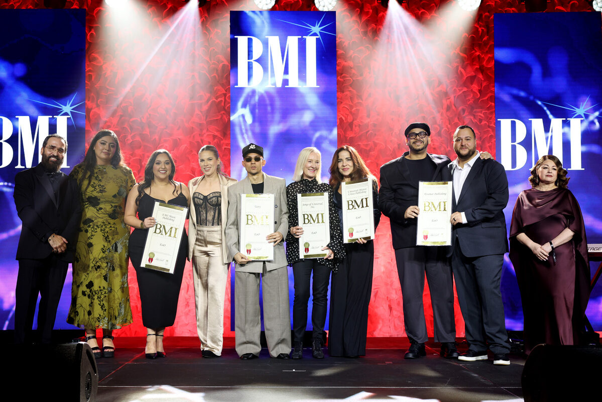 Jesus Gonzalez, BMI Vice President, Creative, Latin, BMI's Alondra Lopez, Tainy and BMI's Maggie Ortiz accept the BMI Top Latin Song Award for 
