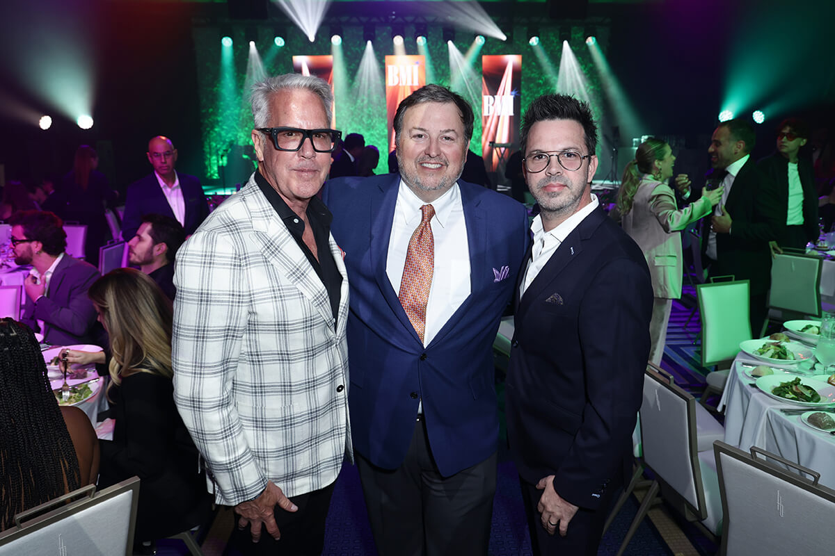 (L-R) John Tolbert, SVP of BRE Hotels & Resorts; BMI's Mason Hunter; Brent Daughrity, President of Music Entertainment, Gallagher attend the 2026 BMI Latin Awards on March 19, 2026, in Miami, Florida. (Photo by John Parra/Getty Images)
