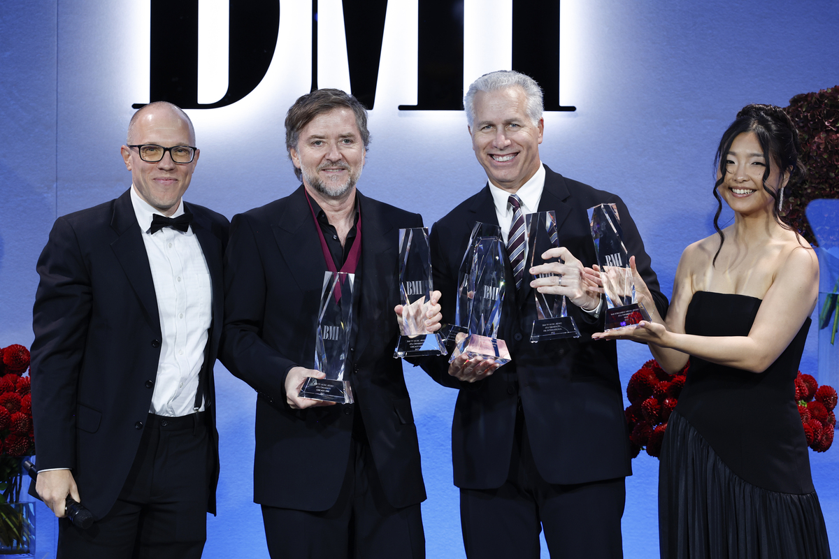 Jon Miller, Director, Creative, Europe, BMI, Atli Örvarsson and Mike Steinberg Executive Vice President, Chief Revenue & Creative Officer, BMI and Anushka Gantumur, Executive, Creative, Europe, BMI onstage during the 2025 BMI London Awards at The Dorchester on September 29, 2025 in London, England. (Photo by John Phillips/Getty Images for BMI)
