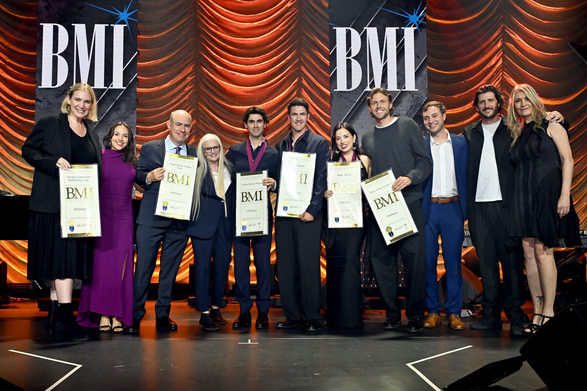 Barbara Cane, VP, Worldwide Creative, BMI (4th L), and Samantha Cox, Vice President, Creative, New York, BMI (R), present BMI Awards for 