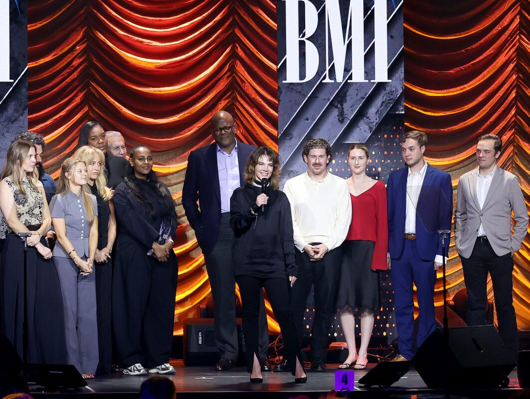 Michael Steinberg, EVP, Chief Revenue & Creative Officer, BMI (6th L) presents the BMI Publisher of the Year Award to Sony Music Publishing team members (from L) Sara Chronert, Nick Bral, Helen Lazenby, Camille Hudson, Lauren Munroe,  Ari Gelaw, Jon Platt, Chairperson, Sony Music Publishing, Katie Welle, President, Head of A&R, Sony Music Publishing, Thomas Krottinger, Scout Marie Easley, Adam Ikner and Will Skalmoski onstage during the 2026 BMI Pop Awards at Beverly Wilshire, A Four Seasons Hotel on May 12, 2026 in Beverly Hills, California. (Photo by JC Olivera/Getty Images for BMI)