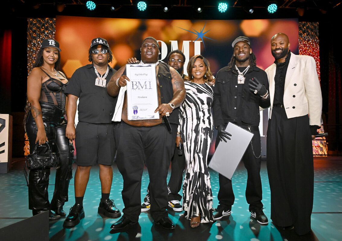 (L-R) Kaine, MurdaGang PB, BigXthaPlug, winner of BMI Award, Yung Hood, Catherine Brewton, VP, Creative, BMI, Ro$ama and Wardell Malloy, Assistant VP, Creative, BMI onstage during the 2025 BMI R&B/Hip-Hop Awards at Fairmont Century Plaza on August 28, 2025 in Los Angeles, California. (Photo by Lester Cohen/Getty Images for BMI)
