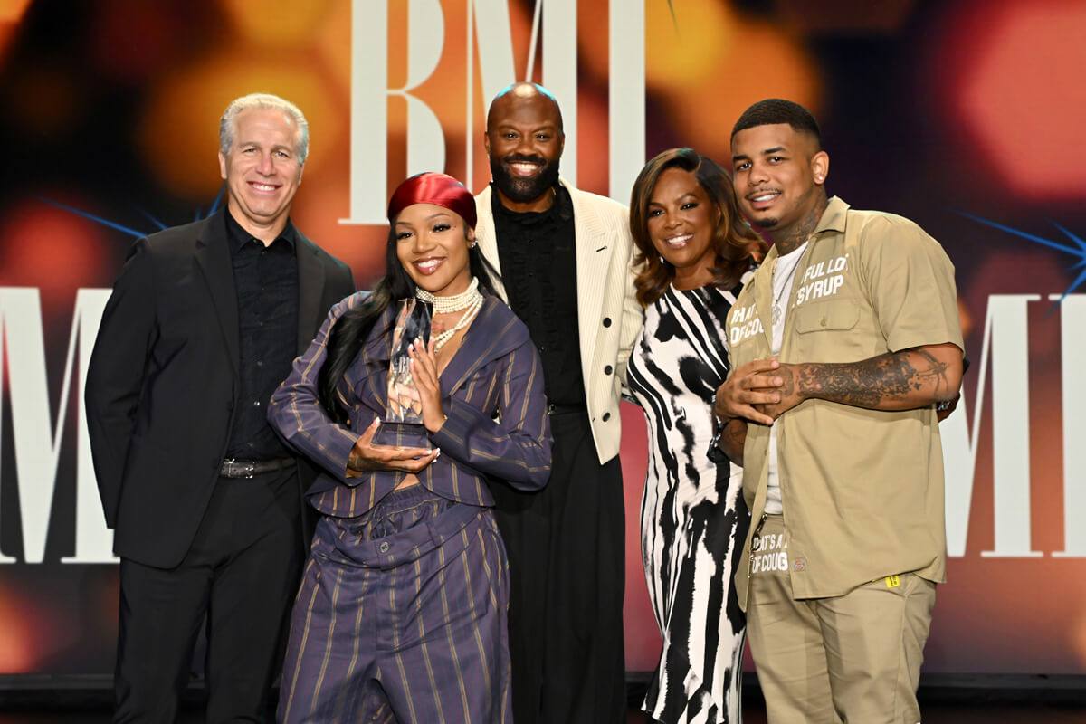 (L-R) Mike Steinberg, EVP, Chief Revenue & Creative Officer, BMI, GloRilla, winner of BMI's Impact Award, Wardell Malloy, Assistant VP, Creative, BMI, Catherine Brewton, VP, Creative, BMI and Rambo onstage during the 2025 BMI R&B/Hip-Hop Awards at Fairmont Century Plaza on August 28, 2025 in Los Angeles, California. (Photo by Lester Cohen/Getty Images for BMI)