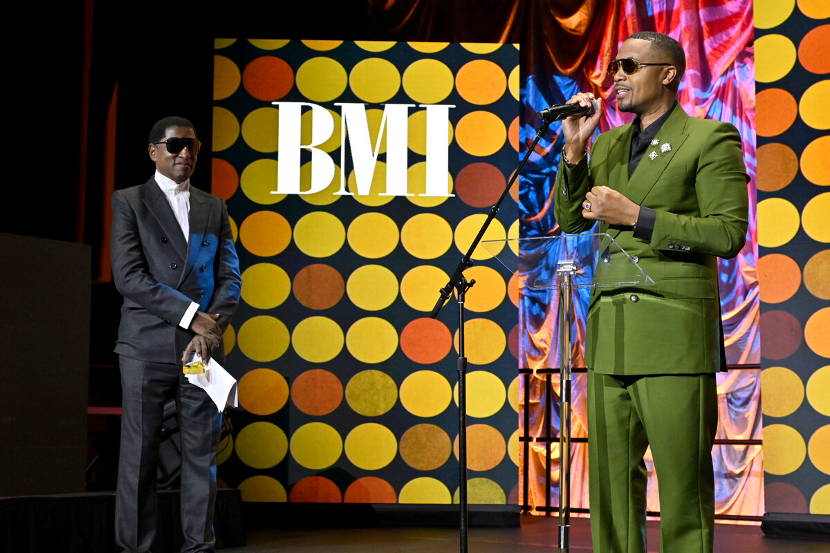 Nas (R) accepts The BMI Icon Award from Babyface (L) onstage during the 2026 BMI R&B/Hip-Hop Awards at Fairmont Century Plaza on August 26, 2026 in Los Angeles, California.  (Photo by Lester Cohen/Getty Images for BMI)